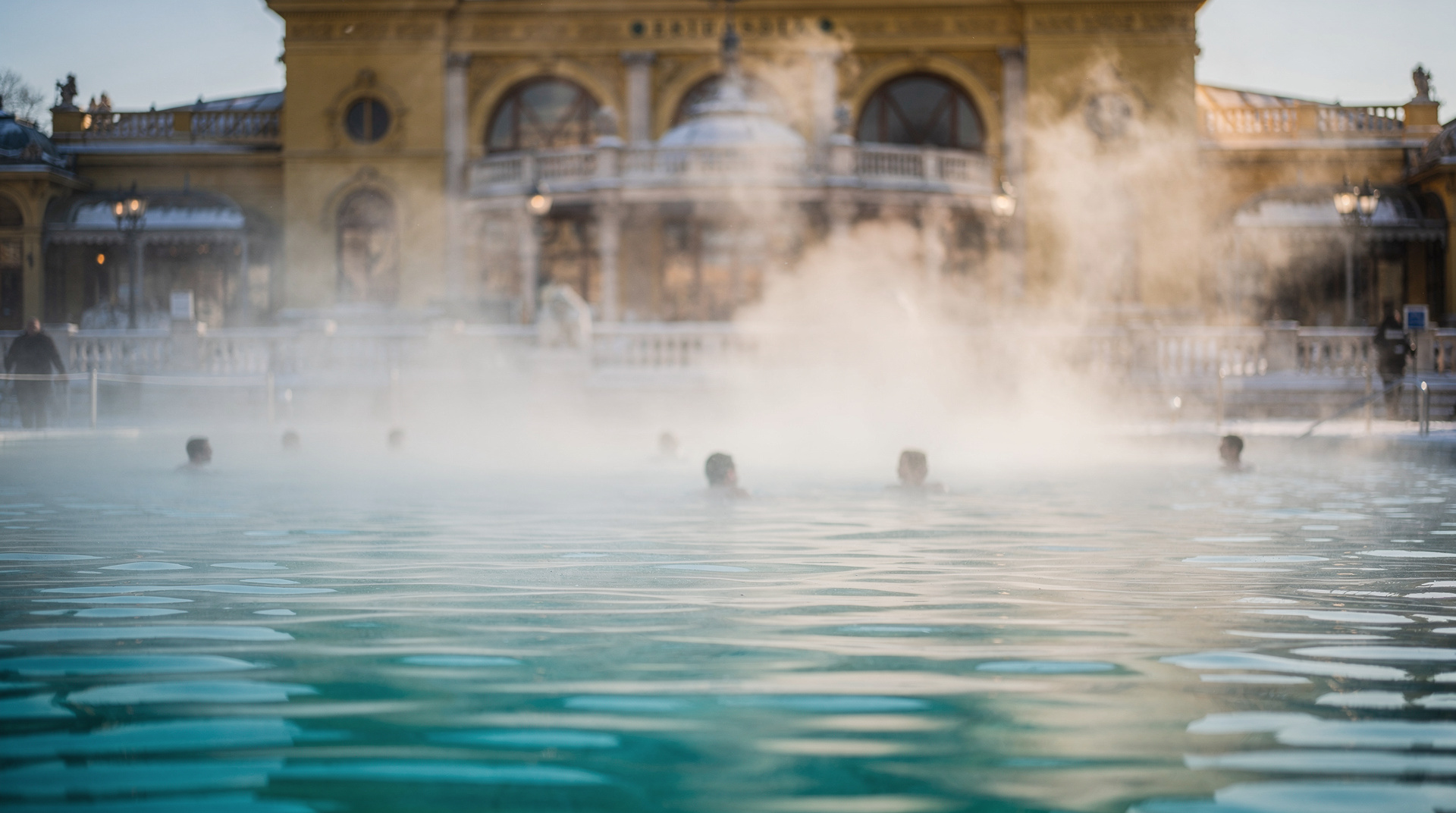 My first winter bath at Széchenyi — What it is actually like to slip into a 38°C outdoor pool while snow falls on th